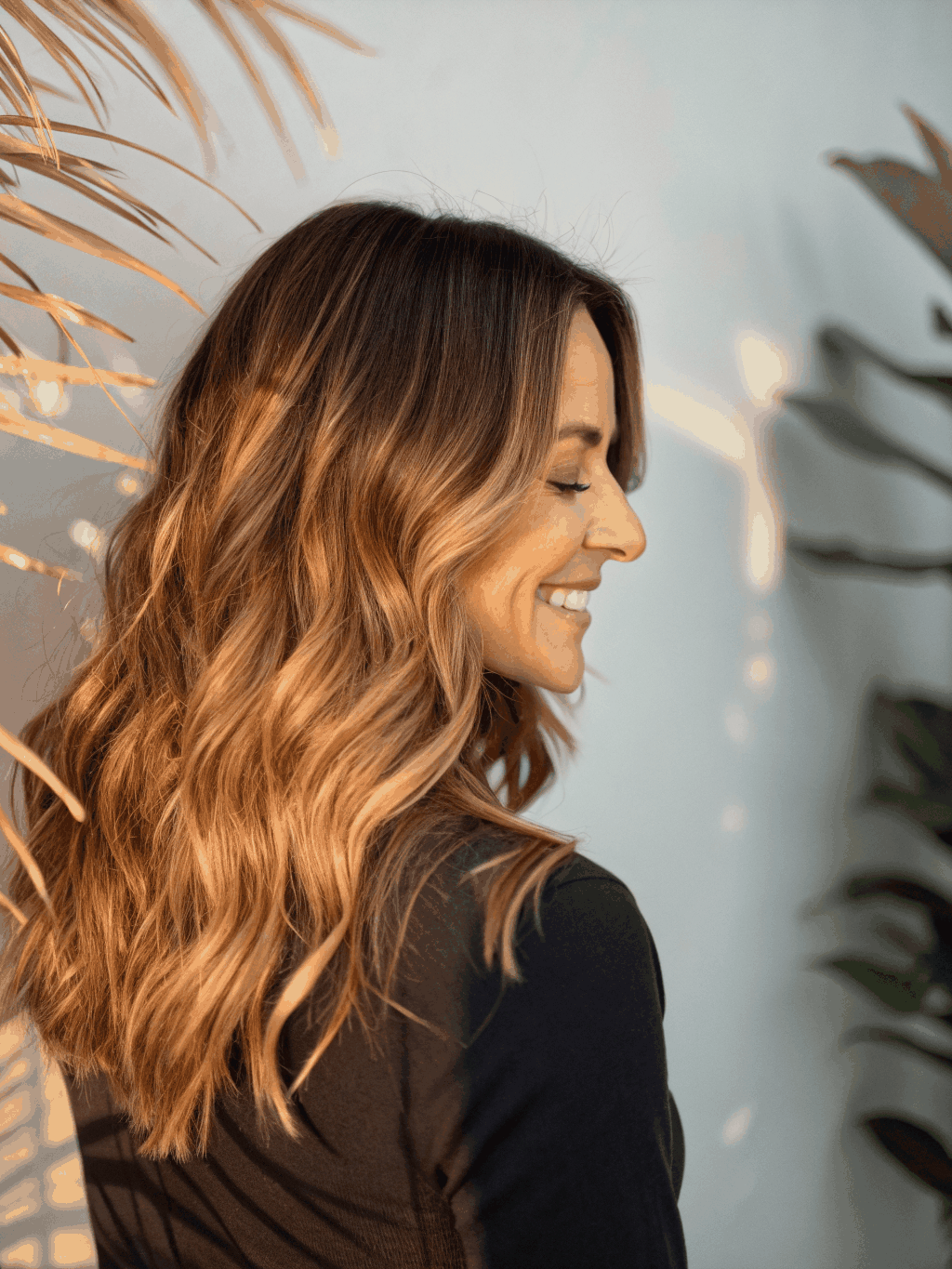 Vibrant balayage color transformation with soft highlights